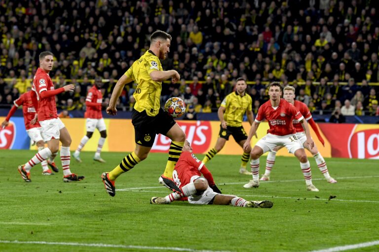 Sancho and Reus Propel Borussia Dortmund to Champions League Quarter-finals